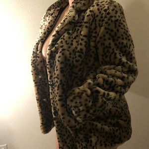 A beautiful faux fur cheetah coat